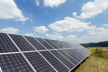 Solar Power Station with cloudy Sky