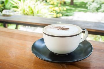capucino coffee on wood table