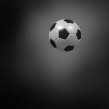 Soccer ball on a dark background