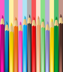 Crayons de couleur sur fond rayé assorti