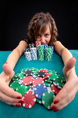Young woman with gambling chips