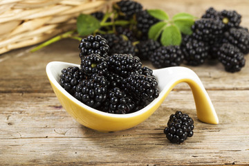 Fresh blackberries on serving spoon