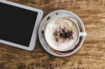Cup of hot cappuccino. Top view.