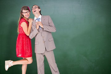 Composite image of hipster couple having fun together 