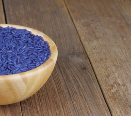 jasmine rice coated with butterfly pea herb in bowl wooden on wo