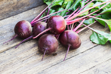 Fresh beet on wooden background
