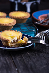 serving homemade lemon tarte