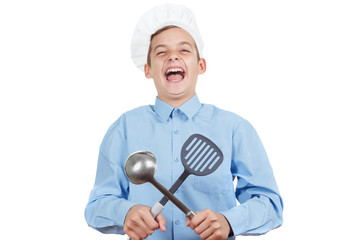 Young cheerful teenager guffaw, laugh loud and humor in a chef's hat. Isolated studio
