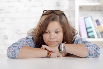 portrait of a teenage girl on her desk