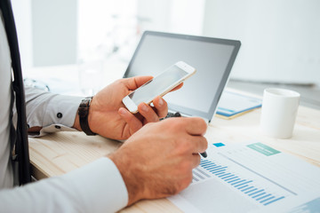 Businessman using a financial app