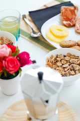 Fototapeta na wymiar Continental breakfast with croissants, orange juice and coffee.