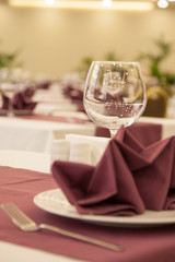 Restaurant table setting with wine glass