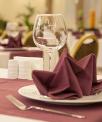 Restaurant table setting with wine glass