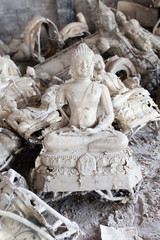Fototapeta na wymiar Softfocus background small Buddha image used as amulet.Thailand