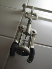 Corkscrew hanging on the wall