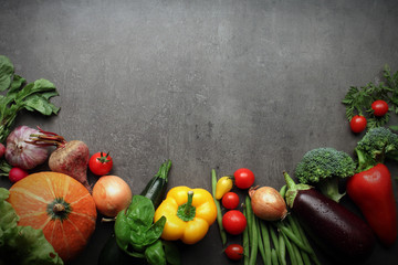 fresh farm vegetables on grey background
