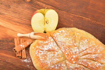 Sweet homemade apple pie with cinnamon and sugar