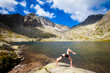 Fototapeta na wymiar Yoga exercising in Tatry mountains