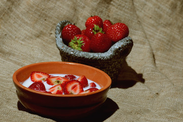 Strawberry close-up bowl with milk