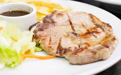 pork t-bone steak,selective focus point