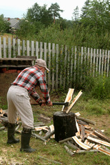 man chopping wood