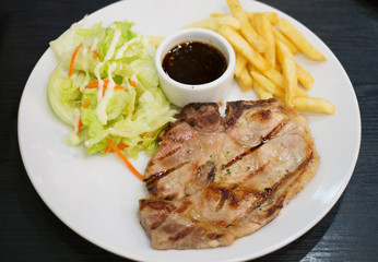 pork t-bone steak,selective focus point