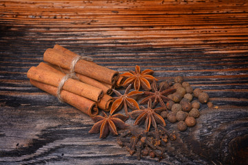 Spices lying on a wooden surface