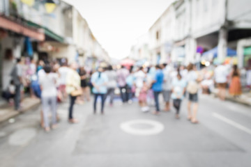 Blurred people walking on the street in phuket old town