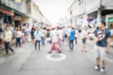 Obraz premium Blurred people walking on the street in phuket old town