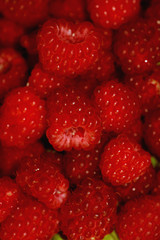 raspberry on a green leaf