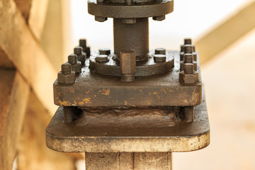 Rusty metal nut with oil Slick