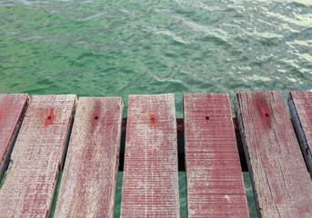 Old brown wood plank on water background