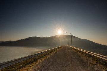 Road on the ridge of a dam