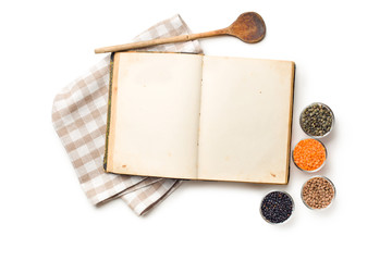 old recipe book and lentils legumes
