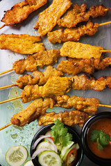 thai grilled pork with curry on stainless steel tray