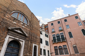 The walls of the old picturesque houses in Venice