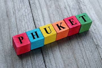 word Phuket (famous thai island) on colorful wooden cubes