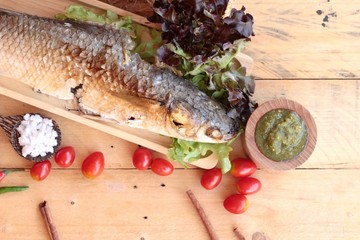 Grilled fish of salt with spicy sauce delicious.