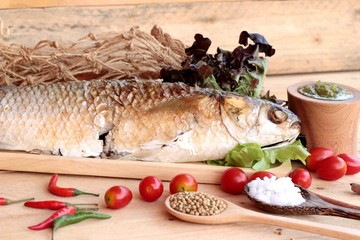 Grilled fish of salt with spicy sauce delicious.