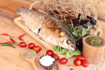 Grilled fish of salt with spicy sauce delicious.