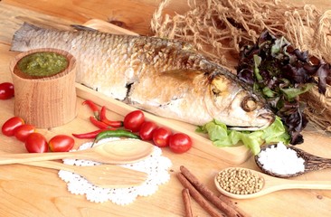 Grilled fish of salt with spicy sauce delicious.