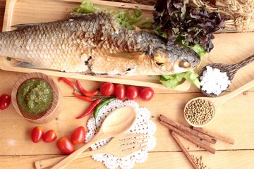 Grilled fish of salt with spicy sauce delicious.