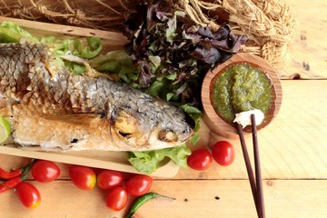 Grilled fish of salt with spicy sauce delicious.