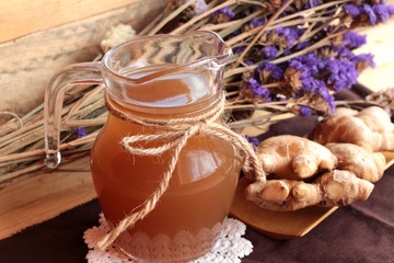 Fototapeta na wymiar Ginger water of herb and fresh ginger with honey.