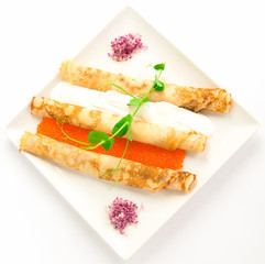 pancakes with red caviar and sour cream