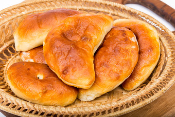 Delicious homemade cakes in a wicker plate