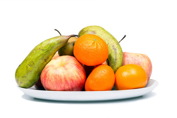 Still life of ripe fruit on a white background