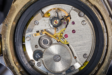 Fototapeta na wymiar Mechanism of old wristwatches