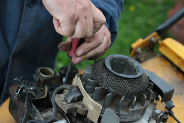 repairing lawn mower engine