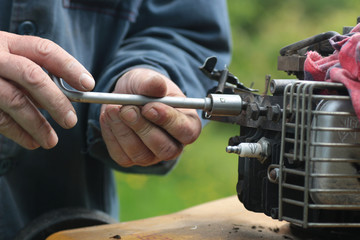 repairing lawn mower engine - obrazy, fototapety, plakaty